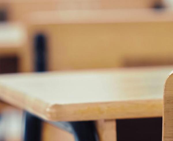 Empty desks in a classroom