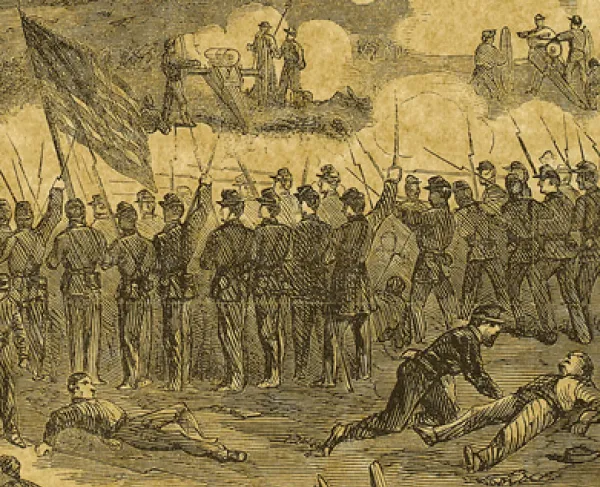 A fallen soldier lying next to a line of soldiers at Perryville
