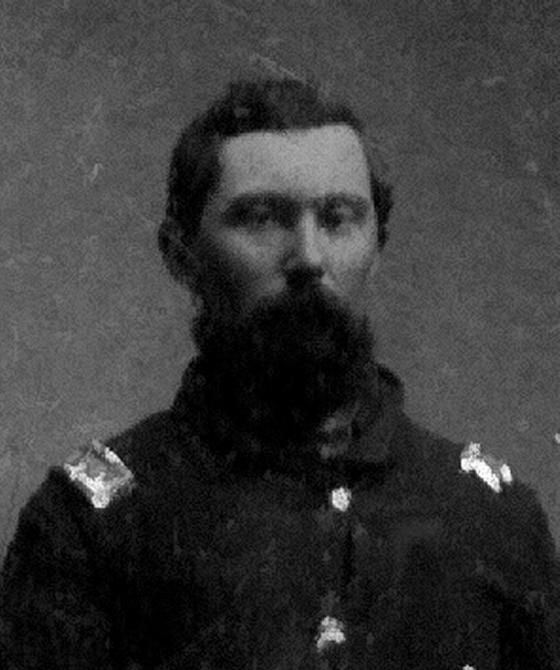 Col. John F. De Courcy 