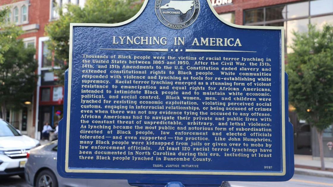 Lynching in America reverse of the Lynching of John Humphries Historical Marker in Pack Square Park