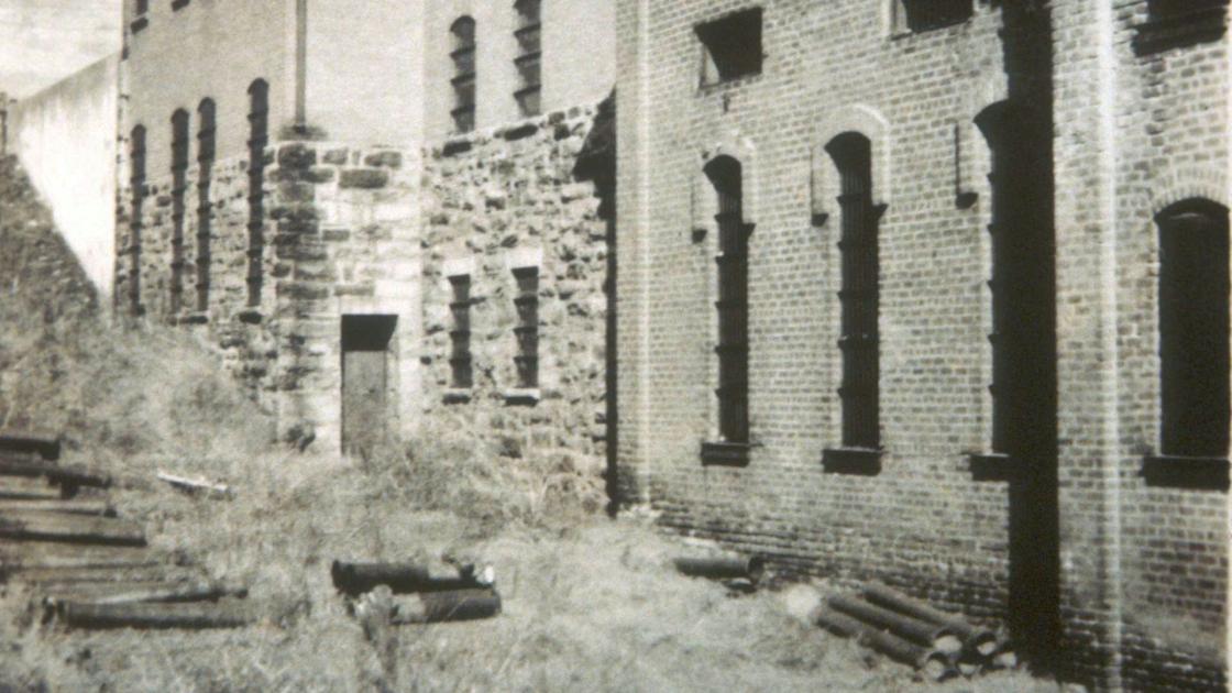 This photo, taken on Eagle Street, features the Asheville Jail. Adjacent to it, on the right, is the former jail, built in the 1880s.