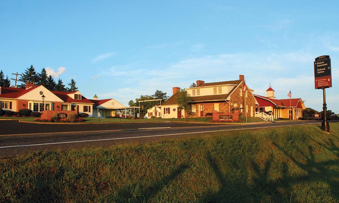 A 2016 photograph of the Mary Thompson House surrounded by modern structures.