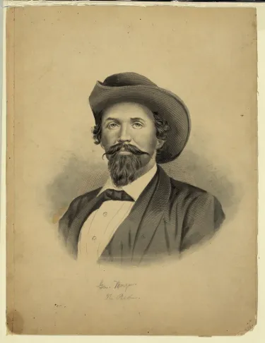 19th century portrait of man with a handlebar mustache wearing a western-type hat and a suit